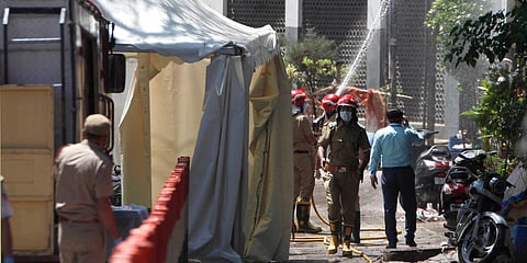 Fire service staff sanitise the Nizamuddin area in New Delhi. (Photo| Anil Shakya, EPS)