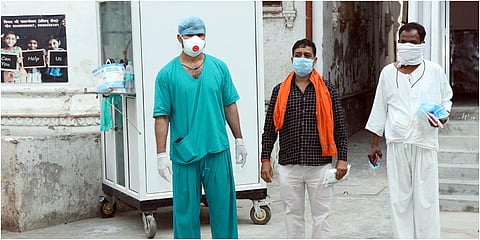 Three COVID-19 patients fully recovered and discharged from King George's Medical University, in Lucknow. (Photo| ANI)