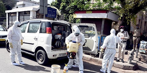 A health worker sanitizes an area due to COVID-19 pandemic. (Photo| Parveen Negi, EPS)