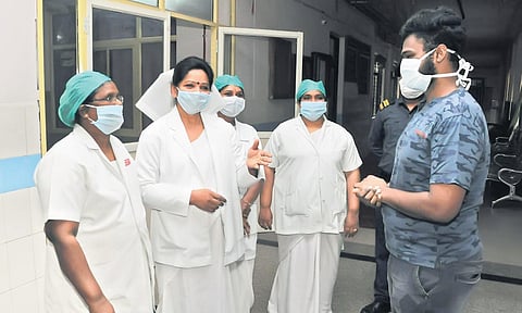The 24-year-old survivor with nurses while being discharged from the New GGH in Vijayawada on Saturday | Prasant Madugula