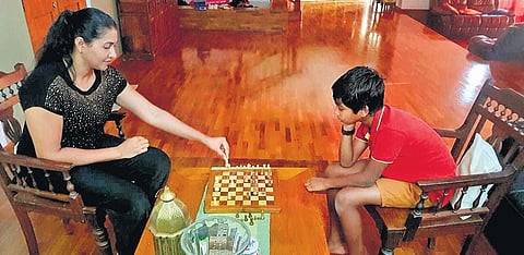 Anju Bobby George with her son at her house in Bengaluru