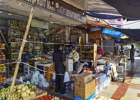 An open grocery shop at the INA market during the complete lockdown imposed in a bid to contain the coronavirus pandemic in New Delhi Sunday April 5 2020. (Photo | PTI)