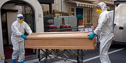 The tally included 5,889 patients who died in hospital and 2,189 people in old age homes and other medical facilities. (Photo | AP)