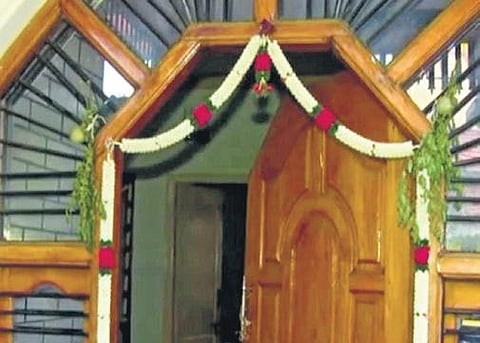 Two strings of the beli mullina kayi weed (above) hanging from the door of a house at Rammanahalli village in Mysuru taluk | Express