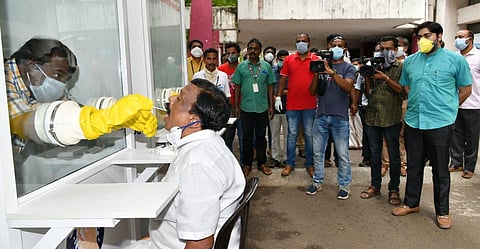 A man being tested for COVID-19 at a WISK