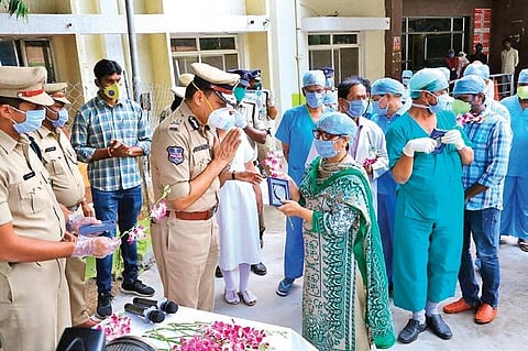 Hyderabad Commissioner of Police Anjani Kumar presents mementos to medical staff of King Koti hospital in Hyderabad on Wednesday