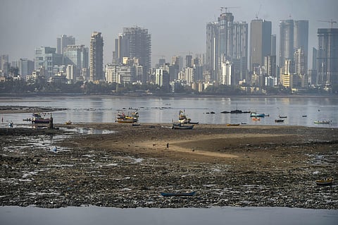 High-rise buildings are seen amid light smog during a nationwide lockdown imposed in the wake of coronavirus pandemic in Mumbai Thursday April 9 2020. (Photo | PTI)