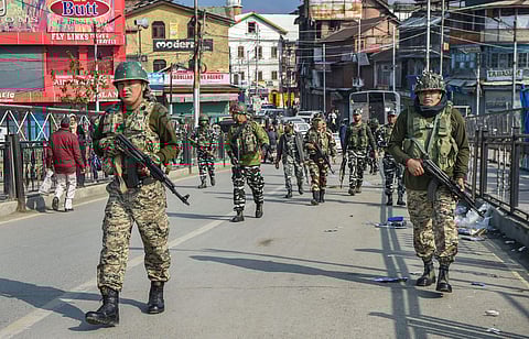 File photo of security personnel sanitising the area after a grenade blast hurled by suspected militants at Hari Singh High Street in Srinagar Monday Nov. 4 2019. (Photo | PTI)