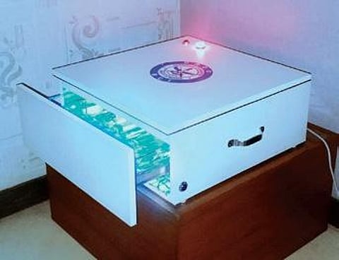 NOTESCLEAN, an automated UVC currency sanitising device