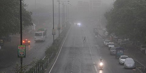 Vehicles passing through rain and duststorm in Delhi on Sunday. (Photo| Anil Shakya, EPS)
