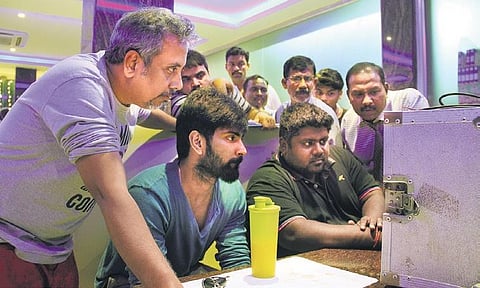 GV Krishnamurthy with director Badri Venkatesh and Atharvaa