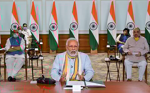 Prime Minister Narendra Modi interacts with the Chief Ministers of various States via video conferencing to discuss COVID-19 situation in New Delhi Monday May 11 2020. (Photo | Twitter)