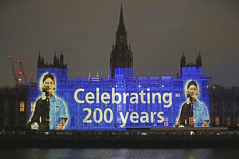 An image of Florence Nightingale is projected on the Houses of Parliament in Westminster, London. (Photo | AP)