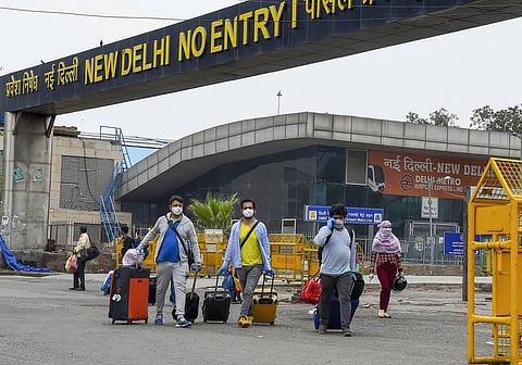 Passengers arrive at New Delhi Railway station following the resumption of passenger train services by Indian Railways connecting major cities during the ongoing COVID-19 nationwide lockdown in New Delhi. (Photo | PTI)