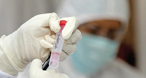 Health care workers collecting samples at a COVID-19 testing centre. (Photo| Shekhar Yadav, EPS)