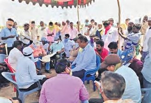 AP and Telangana officials hold discussions to settle row over sand mining on the banks Tungabhadra near Gundrevula village in Kurnool district on Wednesday