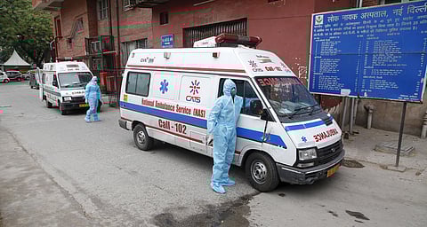 Medical Staff wearing PPE kit stand at LNJP hospital in Delhi during the nationwide lockdown on Sunday. (Photo | Anil Shakya/EPS)