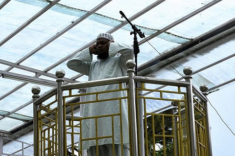 A Muezzin, person appointed to call Muslims to prayers, recites the aazan. (Photo|AFP)