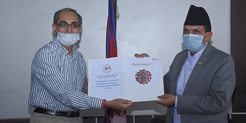 Indian ambassador to Nepal Shri Vinay Mohan Kwatra (L) with Nepal Health Minister Bhanubhakta Dhakal. (Photo| Twitter)