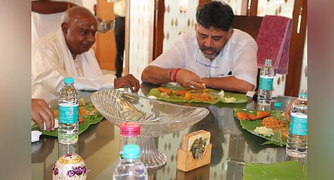 Former Prime Minister HD Deve Gowda has lunch with KPCC president-designate D K Shivakumar in Bengaluru on Monday |Express