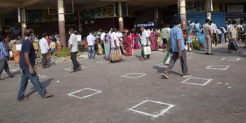 Bus operators wait for clearance of market from new bus stand for operation of buses. (Photo | G Pattabiraman, EPS)