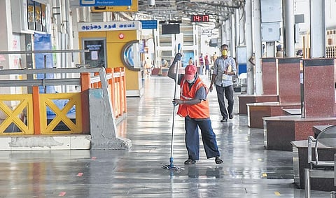 A sanitary worker at work in Tiruchy railway station on Wednesday | M K Ashok Kumar
