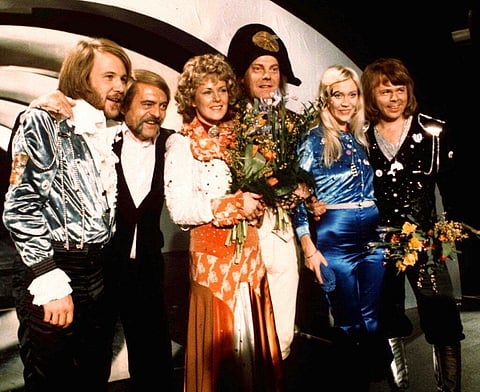In this April 6, 1974 file photo, members of Swedish group ABBA and close associates celebrate the victory of their song 'Waterloo' in the Eurovision Song Contest in Brighton, England. (Photo | AP)