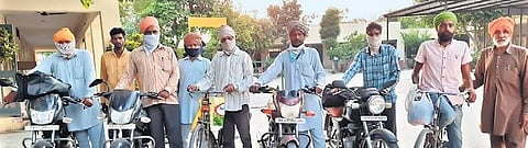 Labourers from Punjab who had travelled to other states with their combines to harvest wheat before the lockdown are now spending their earnings to buy cycles and motorcycles to return.