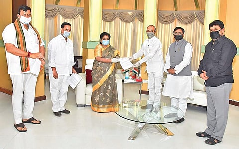 BJP State president Bandi Sanjay Kumar submitting a memorandum to Governor Tamilisai Soundararajan at Raj Bhavan on Saturday.