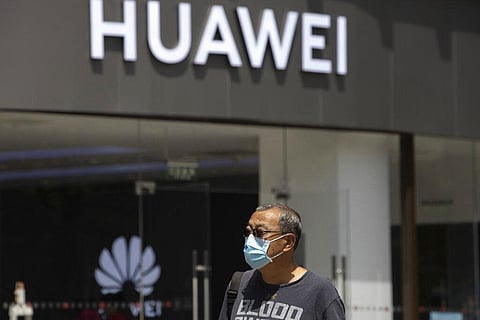 Beijing criticized curbs imposed earlier on tech giant Huawei and other Chinese companies but has yet to say whether it will retaliate. (Photo | AP)