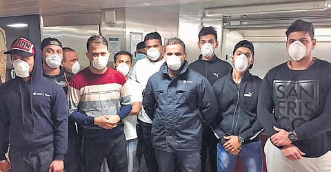 The staffers on board the cruise ship before they were quarantined