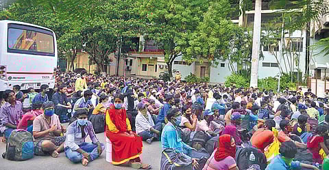 Migrant workers inside Jawaharlal Nehru Stadium on Monday | debdatta mallick