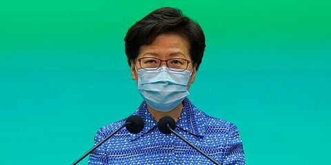 Hong Kong Chief Executive Carrie Lam listens to reporters' questions during a press conference. (Photo | AP)