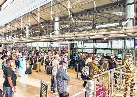 Passengers at the Rajiv Gandhi International Airport in Hyderabad on Monday | Vinay Madapu