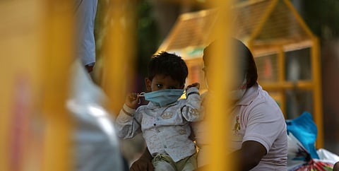 Stranded migrant workers from Bihar gathered to register for a special train. (Photo | Shekhar Yadav, EPS)