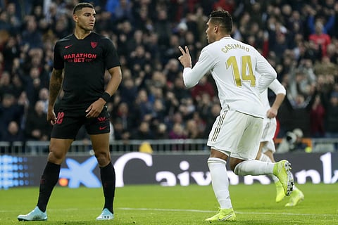 Real Madrid's Casemiro celebrates after scoring his side's second goal during the Spanish La Liga match against Sevilla at Santiago Bernabeu stadium in Madrid. (File Photo | AP)