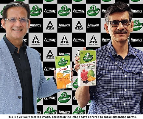 L-R - Mr. Anshu Budhraja, CEO, Amway India and Mr. Hemant Malik, Divisional Chief Executive, Foods Division, ITC Ltd. This is a virtually created image, persons in the image have adhered to social distancing norms.