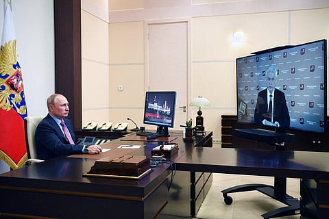 Russian President Vladimir Putin listens to Moscow Mayor Sergei Sobyanin during their meeting via teleconference at the Novo-Ogaryovo residence outside Moscow. (Photo | AP)