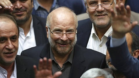 Mohammad Bagher Qalibaf, center, is surrounded by a group of lawmakers after being elected as speaker of the parliament, in Tehran, Iran.