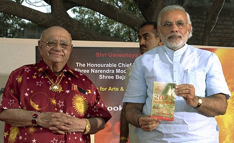Then Gujarat CM Narendra Modi releases a book '2012 End of the world' authored by by Astrologer Bejan Daruwalla in Ahmedabad. (File Photo | PTI)