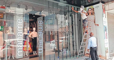 Madame (above) and Atul Jewellers (right) showrooms are being scrupulously cleaned to give visitors a safe and corona-free shopping experience.