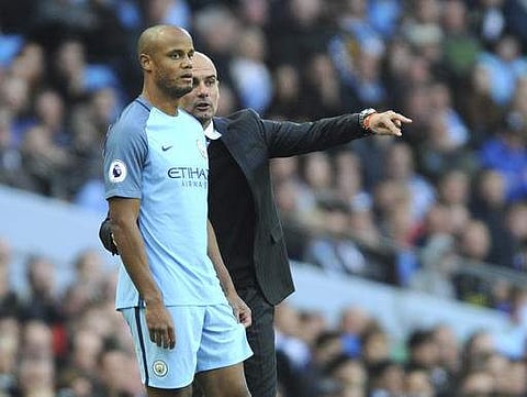 Manchester City manager Pep Guardiola with Vincent Kompany (File Photo|AP)