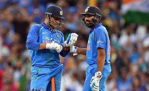India's batsmen Mahendra Singh Dhoni (L) and Rohit Sharma. (Photo | AFP)