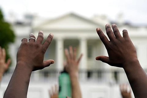 Demonstrators gather across from the White House to protest the death of George Floyd, a black man who died in police custody in Minneapolis, Friday, May 29, 2020, in Washington. (Photo | AP)