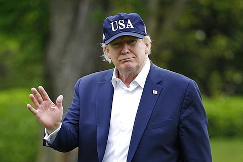 President Donald Trump walks on the South Lawn of the White House after stepping off Marine One, Sunday, May 3, 2020, in Washington. (Photo | AP)