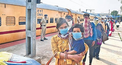 Migrant workers arrive at Chikkabanavara Railway Station in Bengaluru on Sunday to board the first ‘Shramik Special’ train to Odisha | SHRIRAM BN