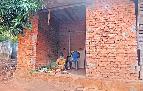 Latha B, who has lost her job as a household worker following the pandemic, has set up a small vegetable stall attached to her home at Ukkodu in Vellayani to survive the lockdown ,Vincent Pulickal