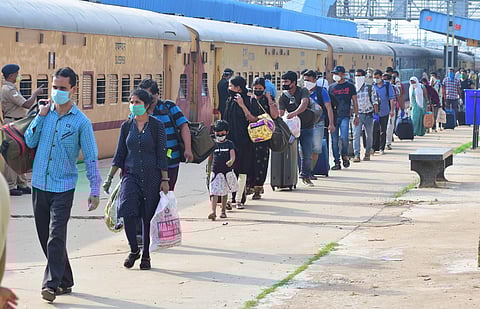 Passengers including many migrant workers heading to board the first Shramik Special of SWR from platform One of Chikkabanavara Railway Station on Sunday morning. (Photo | Shriram BN/EPS)