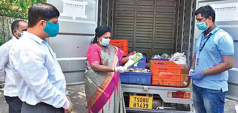 Governor Tamilisai Soundararajan inaugurates a mobile groceries unit at Raj Bhavan on Sunday