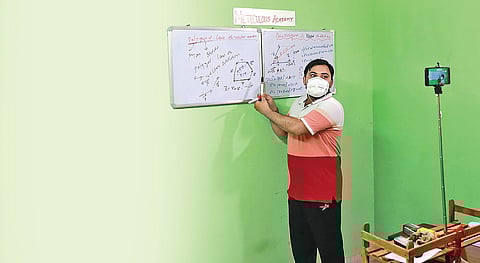 PWD engineer Sudhir Kishore takes an online class on YouTube for Class 11 and Class 12 students during the lockdown. (Photo | Shekhar Yadav, EPS)